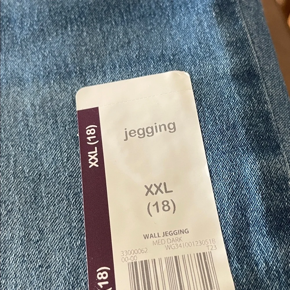 Stack of girls Jeans and Jeggings in Blue and Tan 3 new pair on top